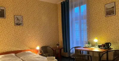 Łóżko lub łóżka w pokoju w obiekcie Hotel i Restauracja Castle