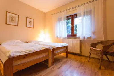 Łóżko lub łóżka w pokoju w obiekcie Aparthouse
