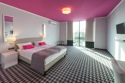 Łóżko lub łóżka w pokoju w obiekcie Hotel Sękowski