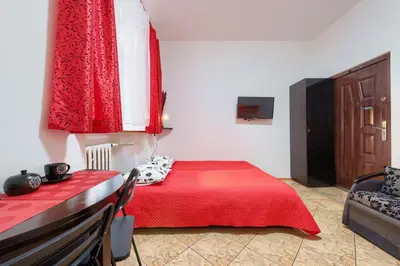 Łóżko lub łóżka w pokoju w obiekcie hostelswidnicka24