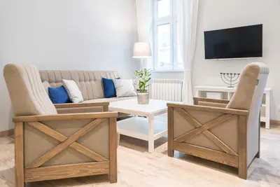 Telewizja i/lub zestaw kina domowego w obiekcie Apartament pod Twierdzą