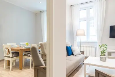 Telewizja i/lub zestaw kina domowego w obiekcie Apartament pod Twierdzą