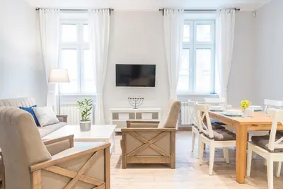Telewizja i/lub zestaw kina domowego w obiekcie Apartament pod Twierdzą