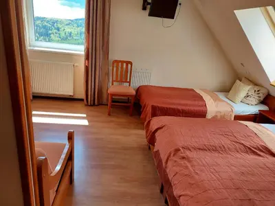 Łóżko lub łóżka w pokoju w obiekcie Agal Zieleniec