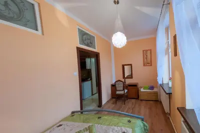 Łóżko lub łóżka w pokoju w obiekcie Apartament Rodzinny Hana