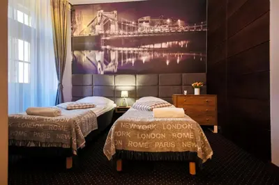 Łóżko lub łóżka w pokoju w obiekcie Boogie ApartHouse Old Town