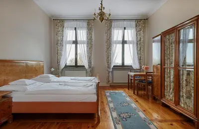 Łóżko lub łóżka w pokoju w obiekcie Pałac w Orli - pokoje, restauracja
