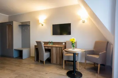Telewizja i/lub zestaw kina domowego w obiekcie Hotel Nowy Zdrój - Centrum Zdrowia i Wypoczynku