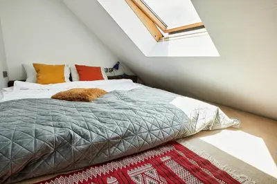 Łóżko lub łóżka w pokoju w obiekcie Cesar Apartment
