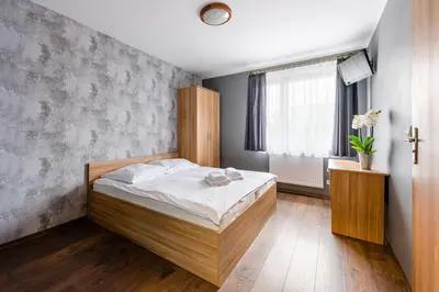 Łóżko lub łóżka w pokoju w obiekcie Sleep&Go