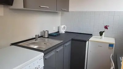 Kuchnia lub aneks kuchenny w obiekcie Sand Apartment
