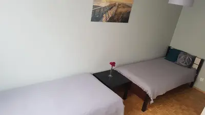 Łóżko lub łóżka w pokoju w obiekcie Sand Apartment