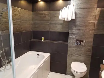 Łazienka w obiekcie Pod Kominem Pokoje i Apartamenty