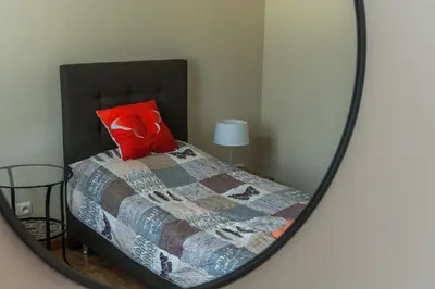 Łóżko lub łóżka w pokoju w obiekcie Apartament Zdrojowa 45