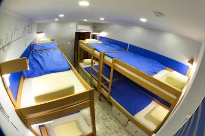 Łóżko lub łóżka w pokoju w obiekcie Event Hostel - Opole