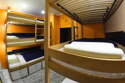 Łóżko lub łóżka w pokoju w obiekcie Event Hostel - Opole