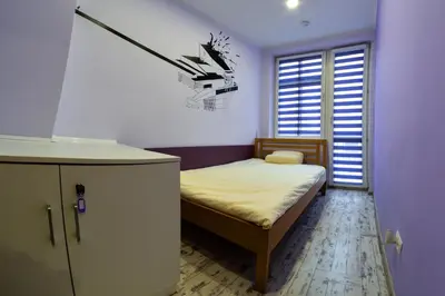 Łóżko lub łóżka w pokoju w obiekcie Event Hostel - Opole