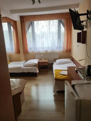 Łóżko lub łóżka w pokoju w obiekcie O.W.S. Strzecha
