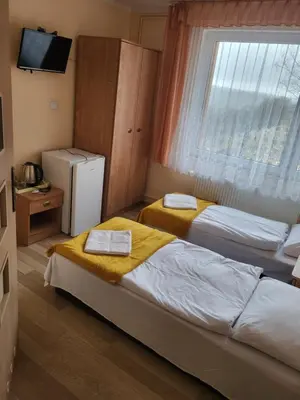 Łóżko lub łóżka w pokoju w obiekcie O.W.S. Strzecha