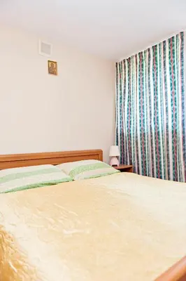 Łóżko lub łóżka w pokoju w obiekcie Agroturystyka Wzgórze Magnolii
