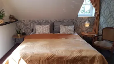 Łóżko lub łóżka w pokoju w obiekcie Willa Skalniak