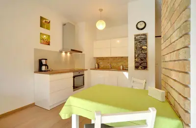 Kuchnia lub aneks kuchenny w obiekcie Apartament Wille Parkowe