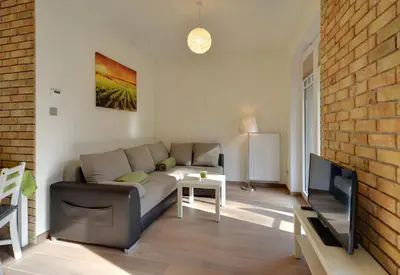 Telewizja i/lub zestaw kina domowego w obiekcie Apartament Wille Parkowe