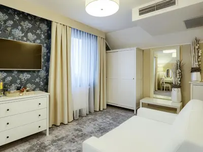 Łóżko lub łóżka w pokoju w obiekcie Hotel Antek