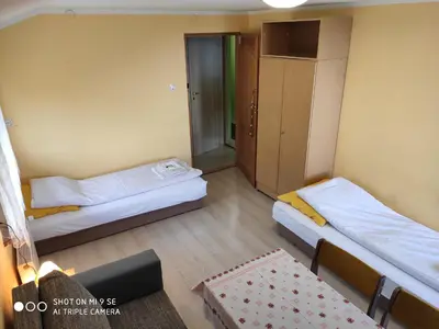 Łóżko lub łóżka w pokoju w obiekcie Chata Na Przełęczy