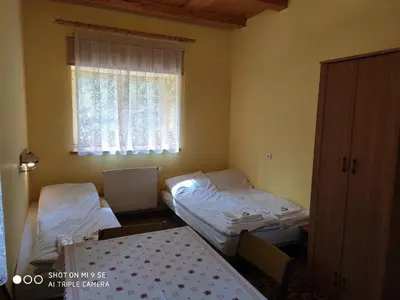 Łóżko lub łóżka w pokoju w obiekcie Chata Na Przełęczy