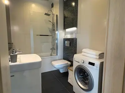 Łazienka w obiekcie Apartamenty Mariańska 103