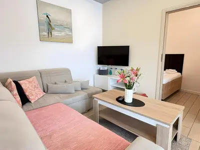 Telewizja i/lub zestaw kina domowego w obiekcie Apartamenty Mariańska 103