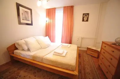 Łóżko lub łóżka w pokoju w obiekcie Apartament Tais