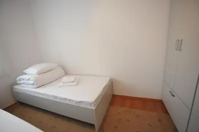 Łóżko lub łóżka w pokoju w obiekcie Apartament Tais