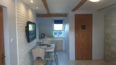 Telewizja i/lub zestaw kina domowego w obiekcie Apartamenty Wiktora