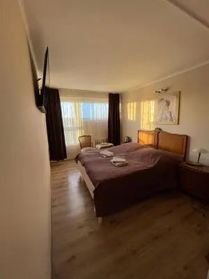 Łóżko lub łóżka w pokoju w obiekcie Gościniec Raciborski