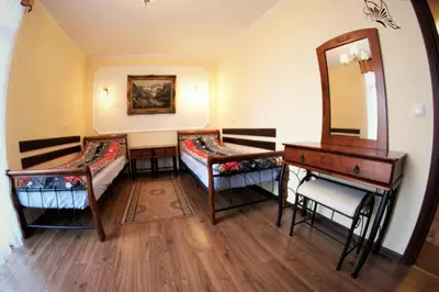 Łóżko lub łóżka w pokoju w obiekcie Apartament Morawka