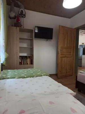 Telewizja i/lub zestaw kina domowego w obiekcie Apartamenty w Dolinie Gościna
