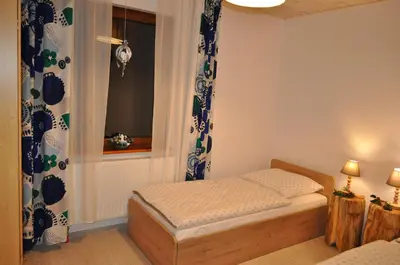 Łóżko lub łóżka w pokoju w obiekcie Apartamenty w Dolinie Gościna