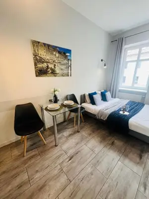 Łóżko lub łóżka w pokoju w obiekcie Property Apart - Ruska Centrum