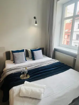 Łóżko lub łóżka w pokoju w obiekcie Property Apart - Ruska Centrum