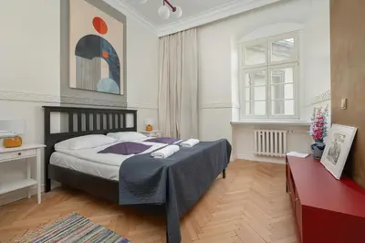 Łóżko lub łóżka w pokoju w obiekcie Exclusive Old Town Apartment by Noclegi Renters