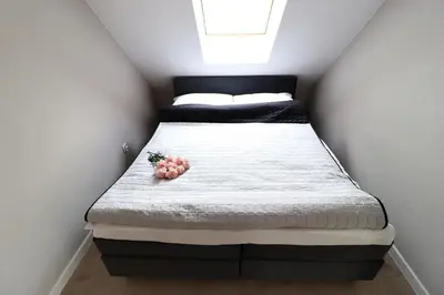 Łóżko lub łóżka w pokoju w obiekcie Apartamenty BM'Kruk