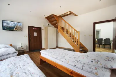 Łóżko lub łóżka w pokoju w obiekcie Kościuszki 3 Apartamenty