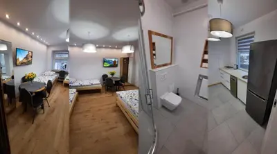 Telewizja i/lub zestaw kina domowego w obiekcie Kościuszki 3 Apartamenty