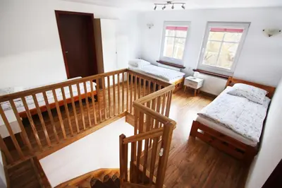 Łóżko lub łóżka w pokoju w obiekcie Kościuszki 3 Apartamenty