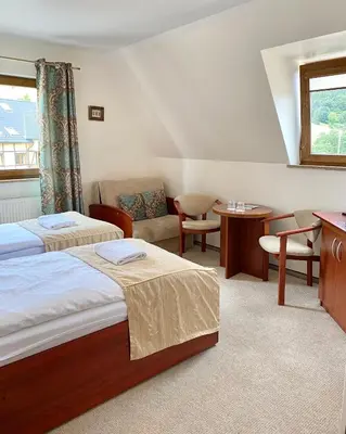Łóżko lub łóżka w pokoju w obiekcie Ski&Spa Zieleniec