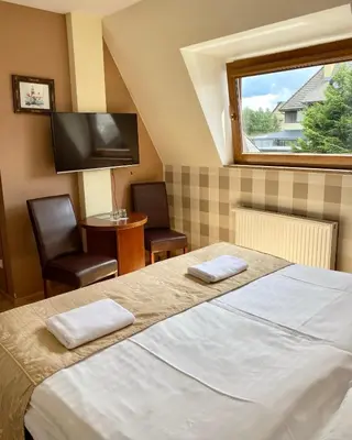Łóżko lub łóżka w pokoju w obiekcie Ski&Spa Zieleniec