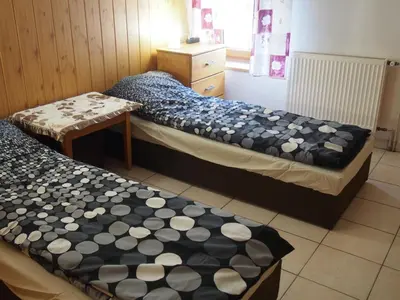 Łóżko lub łóżka w pokoju w obiekcie Agroturystyka OdważnyTeam