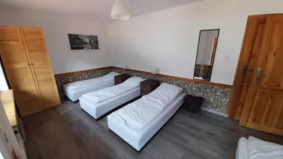 Łóżko lub łóżka w pokoju w obiekcie Agroturystyka OdważnyTeam
